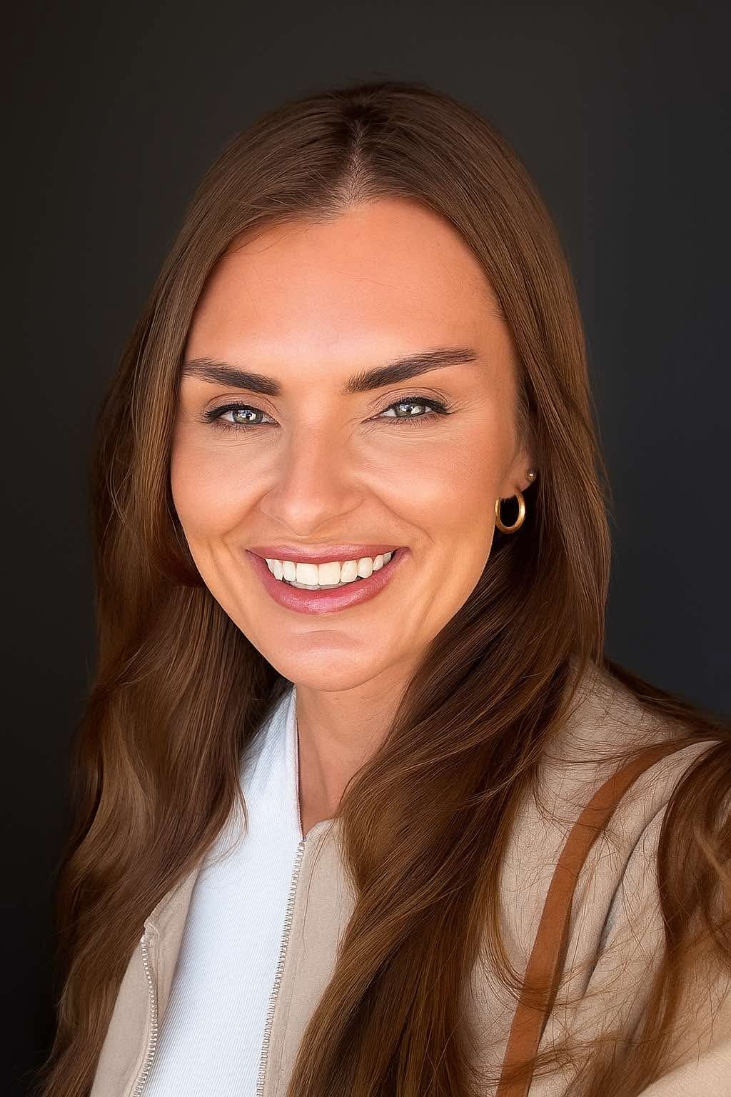 Chelsey, co-owner of TAWK, smiling
